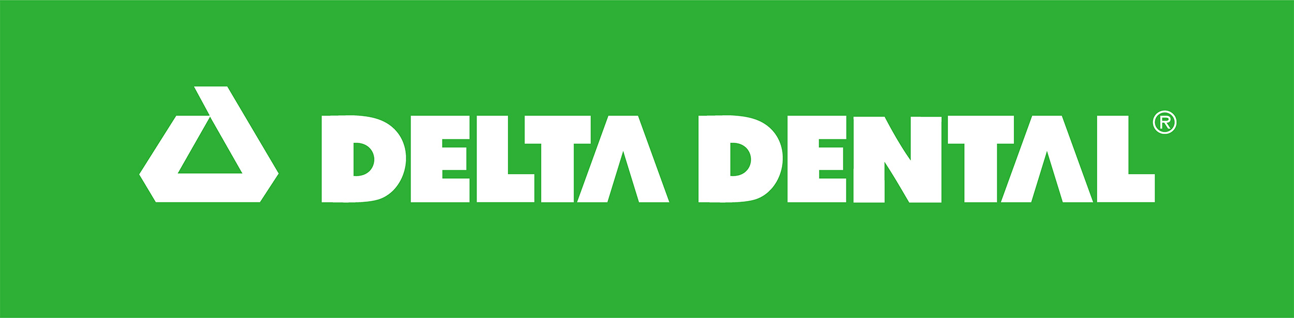 Delta dental logo on a green background.